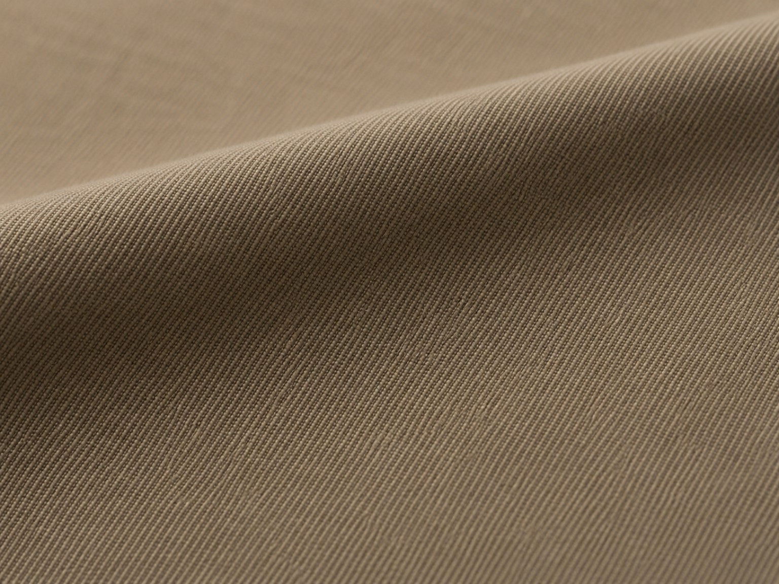 Macro de gabardine mostrando diagonal fina, regular e superfície fechada